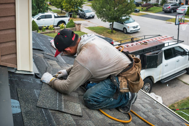 Professional Roofing technician working in Houston, TX